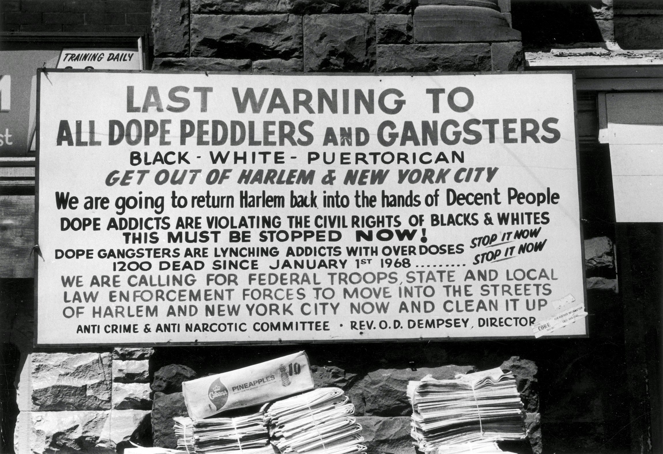 A warning sign to drug dealers, users, and gang members, calling for federal, state, and city intervention to clean up Harlem and protect the lives of its residents, posted on a street, New York City, circa 1970. Photo by Leo Vals/Hulton Archive/Getty Images.